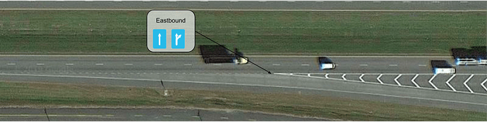 The exit lane does not reach full width until the gore point; map as part of the rightmost continue-straight lane